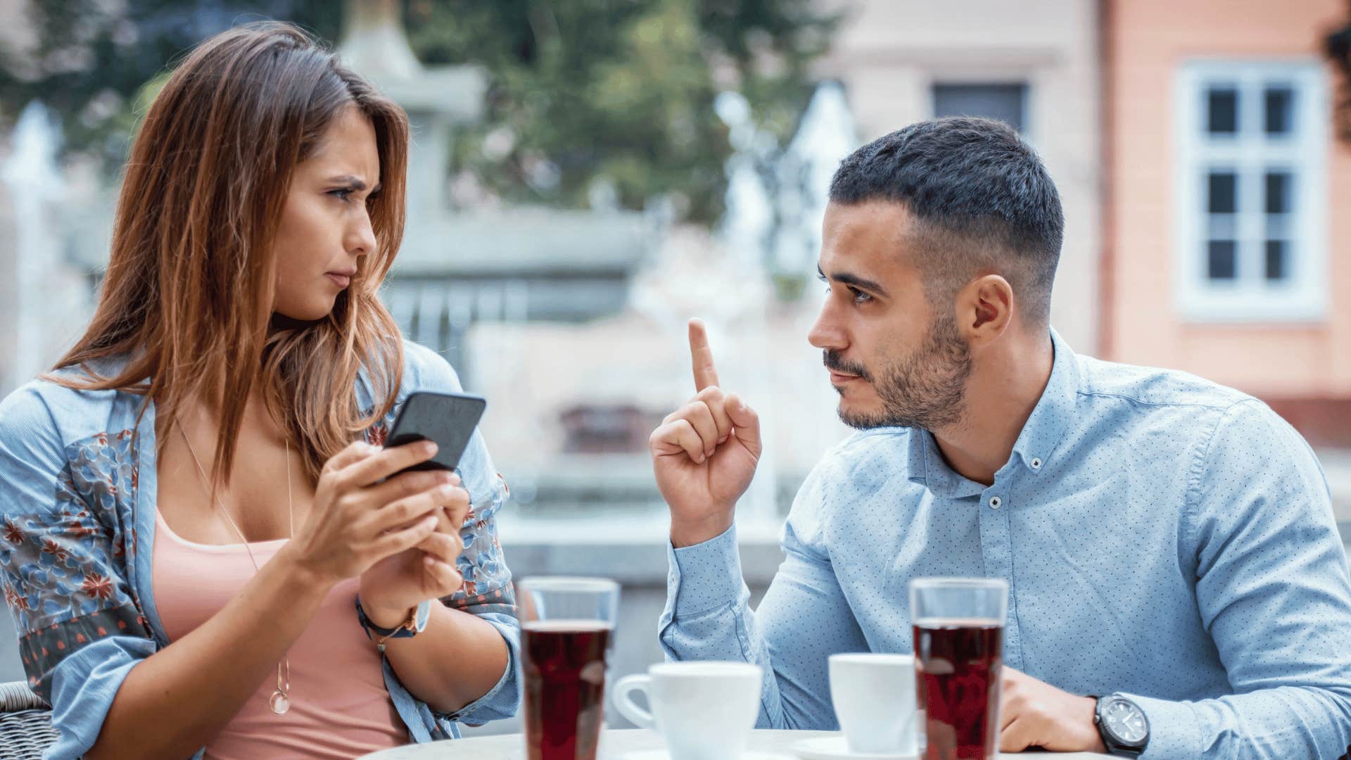 man interrupting woman rudely