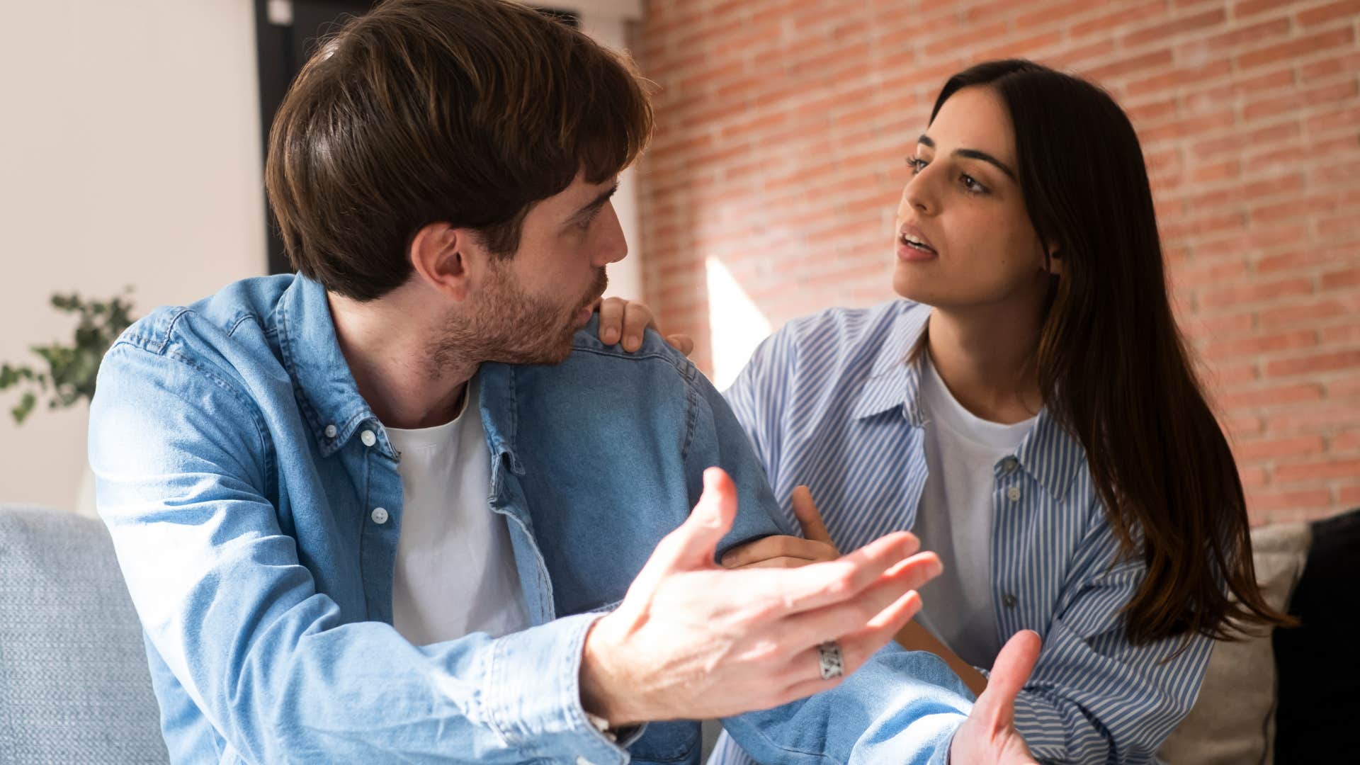 man arguing with his upset partner