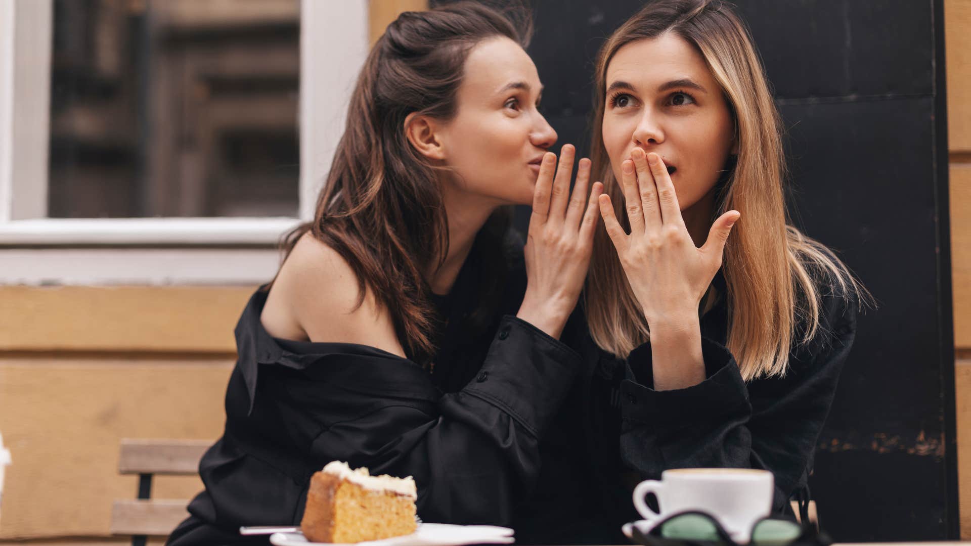 woman kissing up to her friend