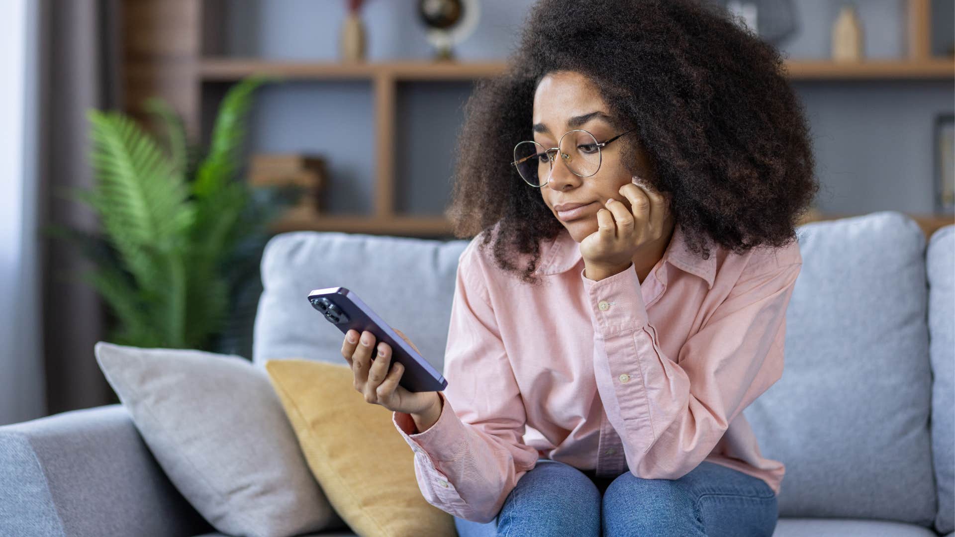 woman disconnecting on her phone