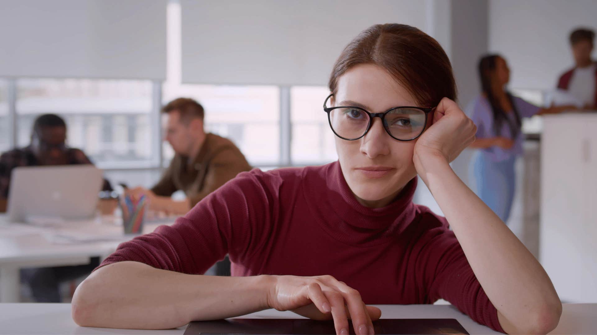 stressed woman zoning out at work