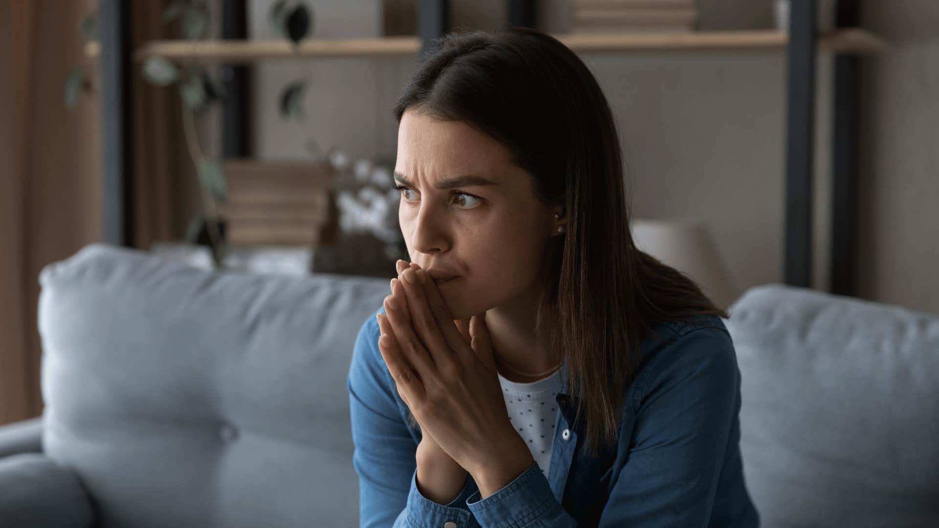 woman putting off making a big decision