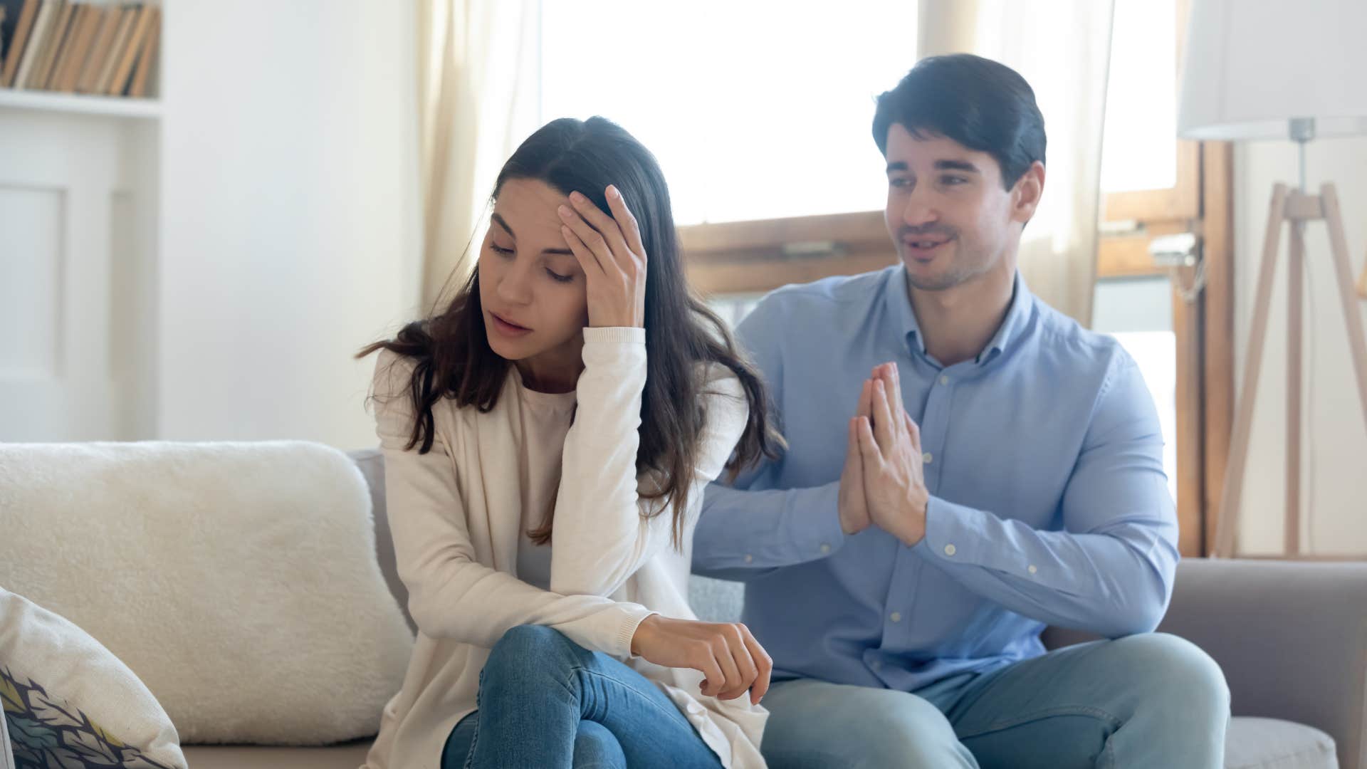 man asking woman for something