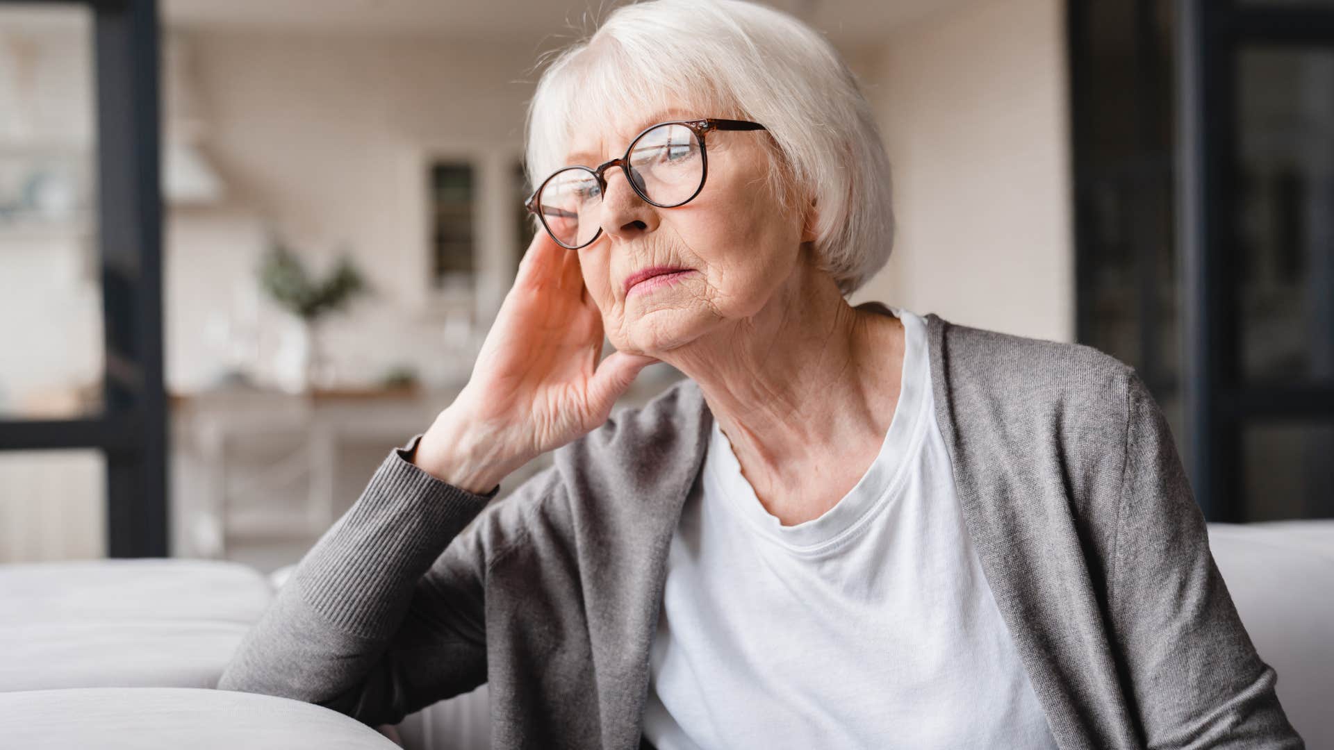 sad older woman looking lonely