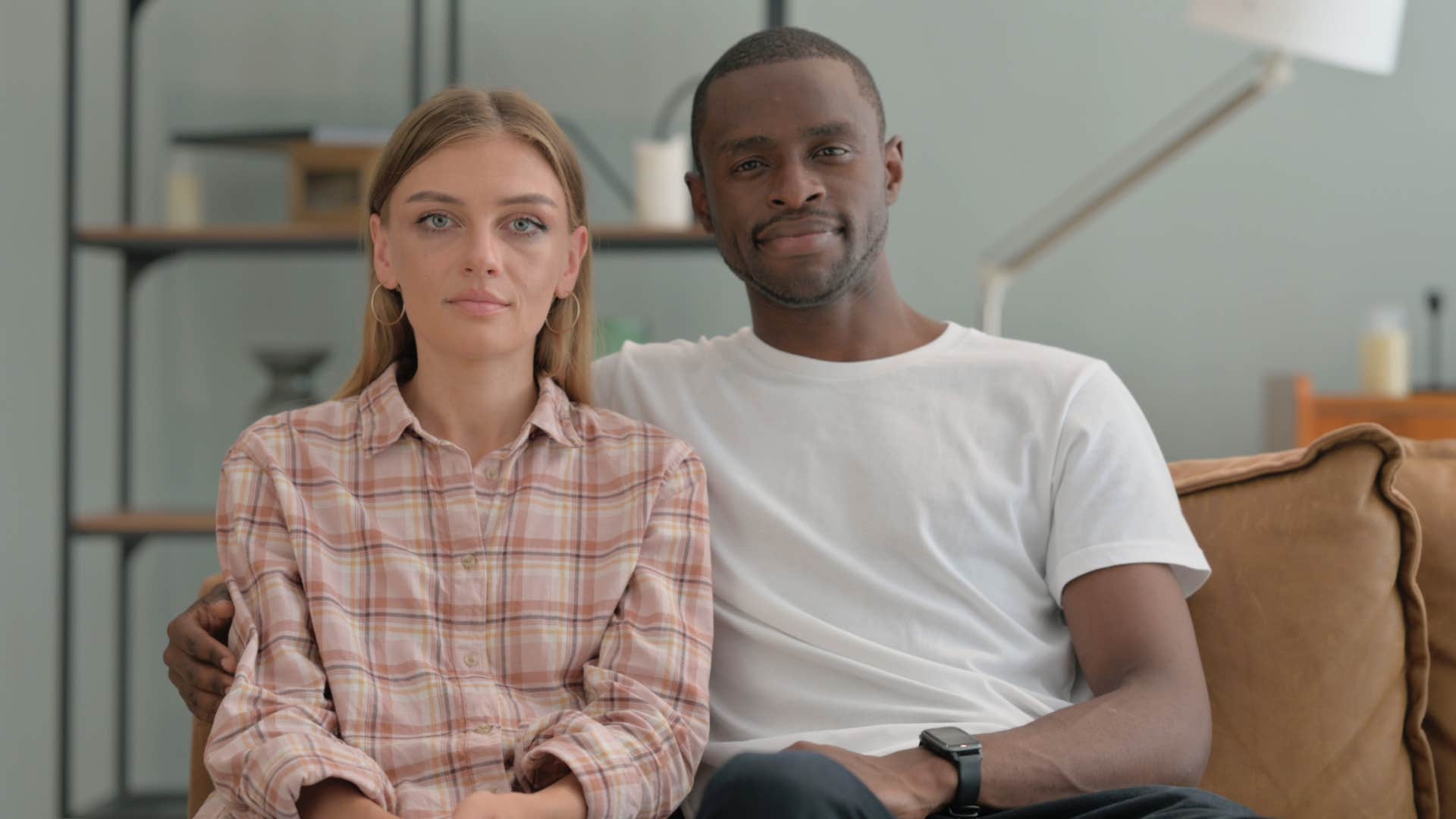 couple sitting on couch together