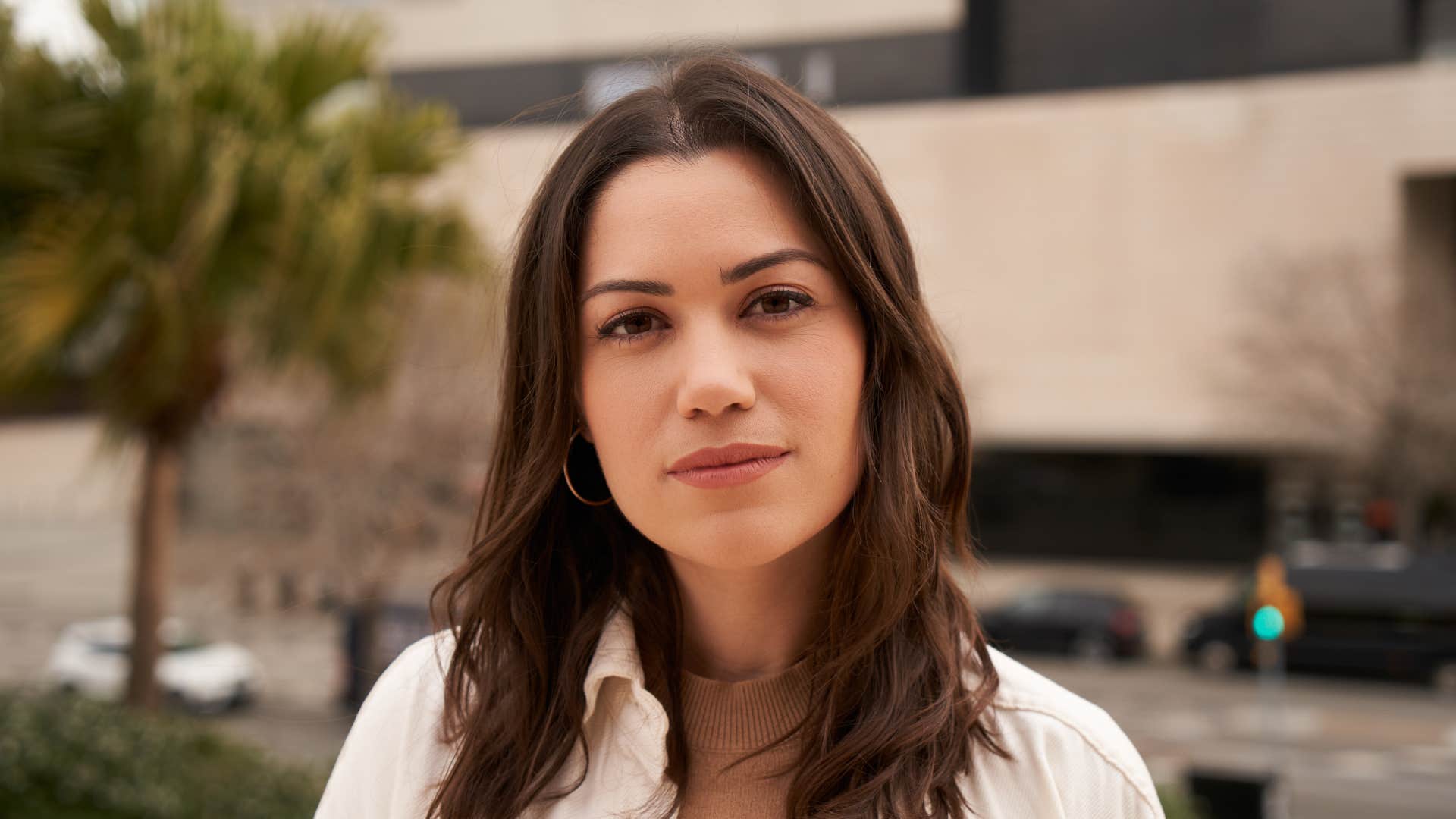 close up of woman standing outside