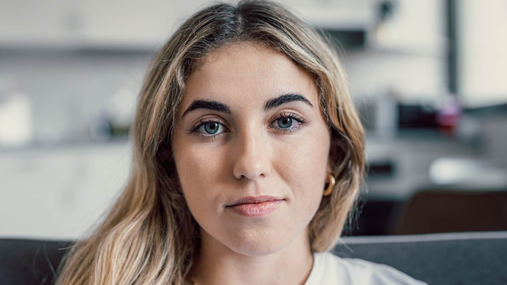 portrait of young woman looking into camera