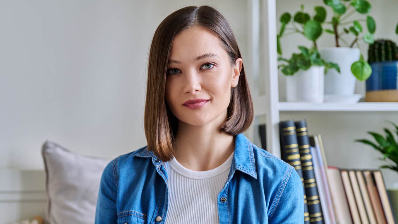 young intelligent woman in jean jacket