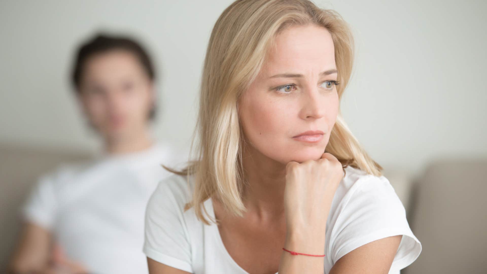 woman refusing to celebrate friends' successes 