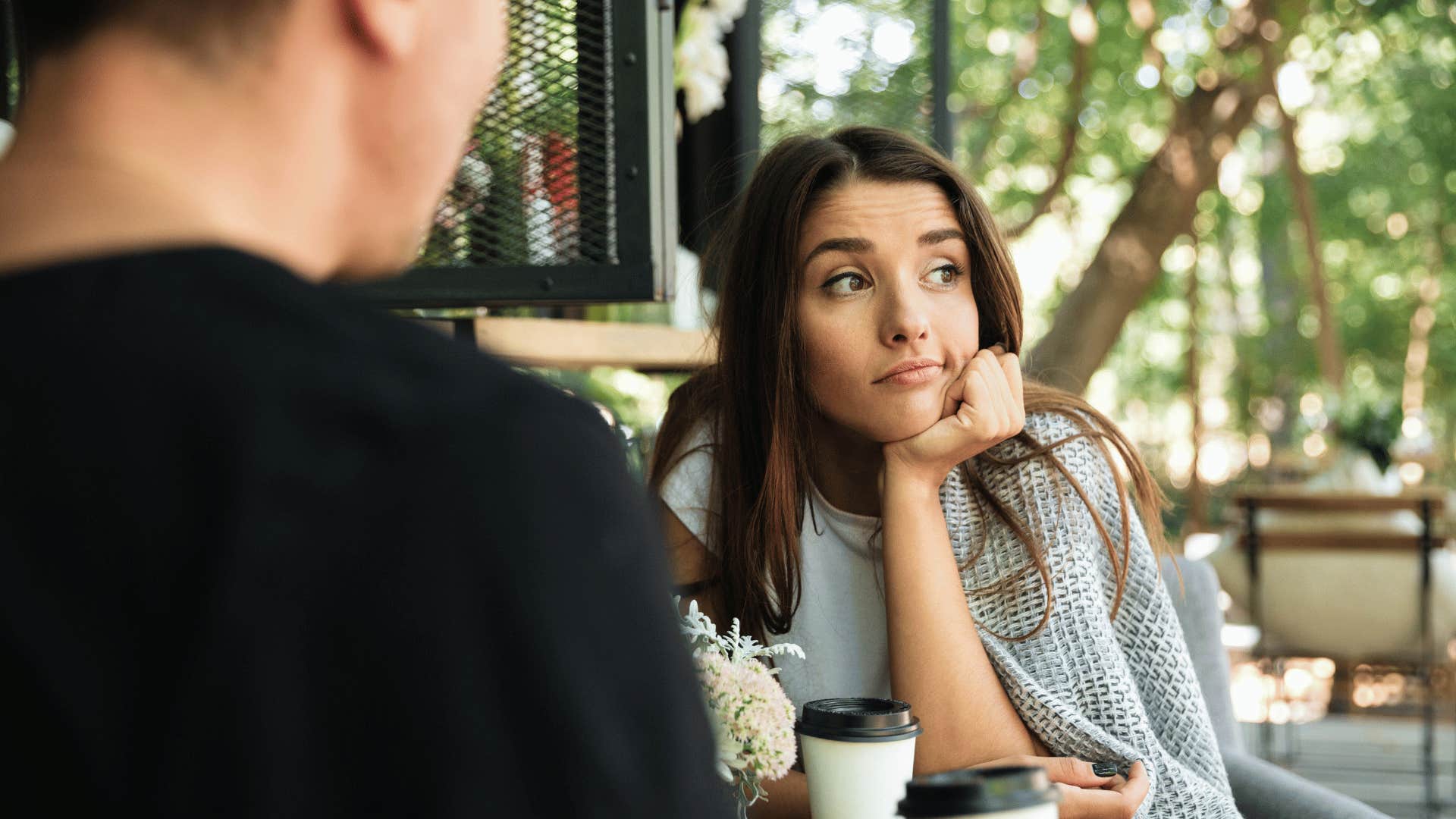 unromantic woman on a date with husband