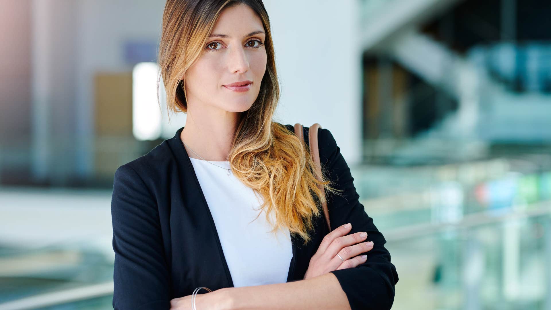 woman standing with strong body language