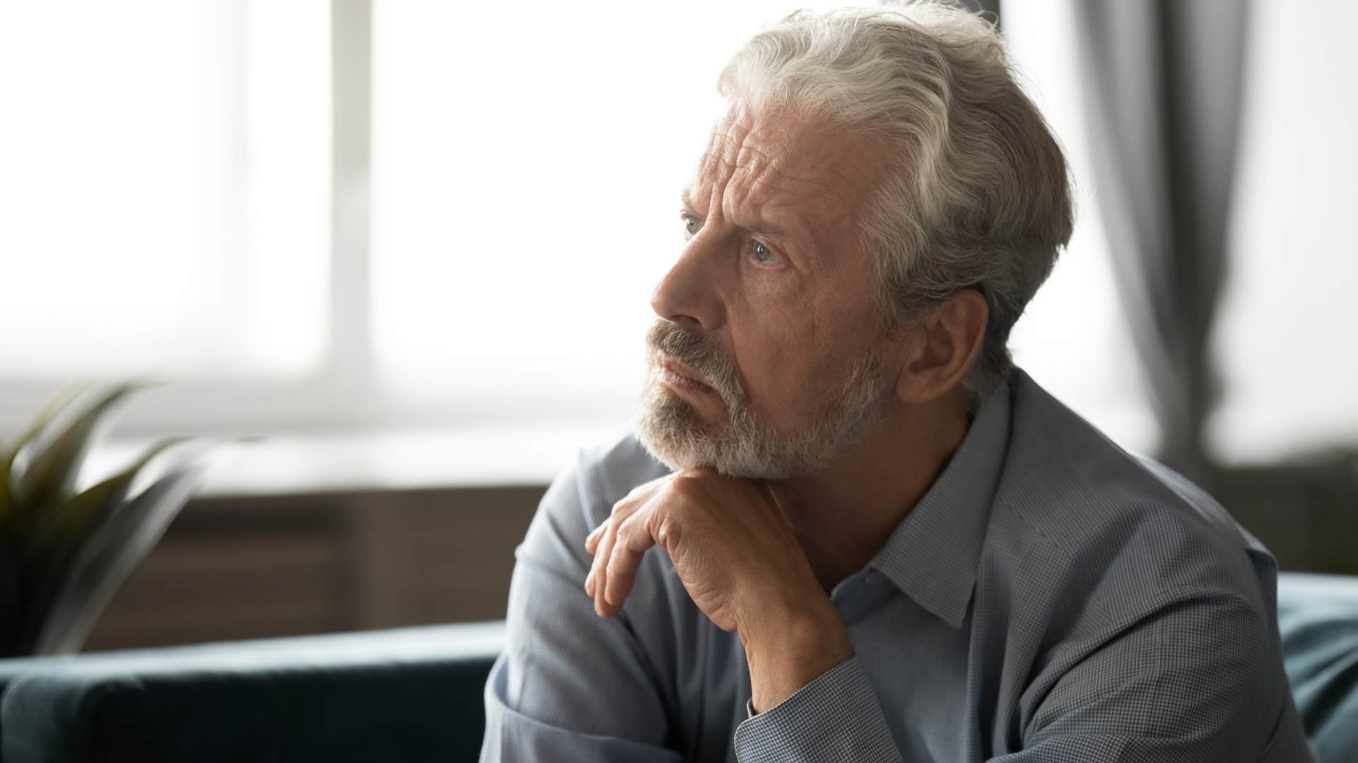 upset older man looking away