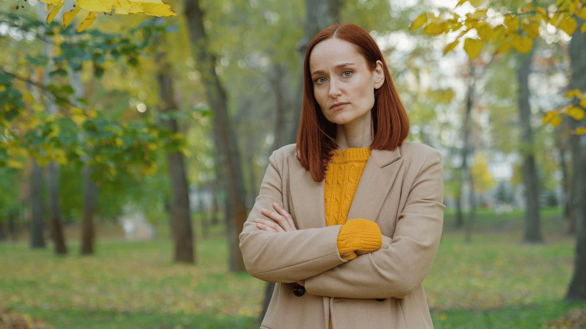 upset woman in park