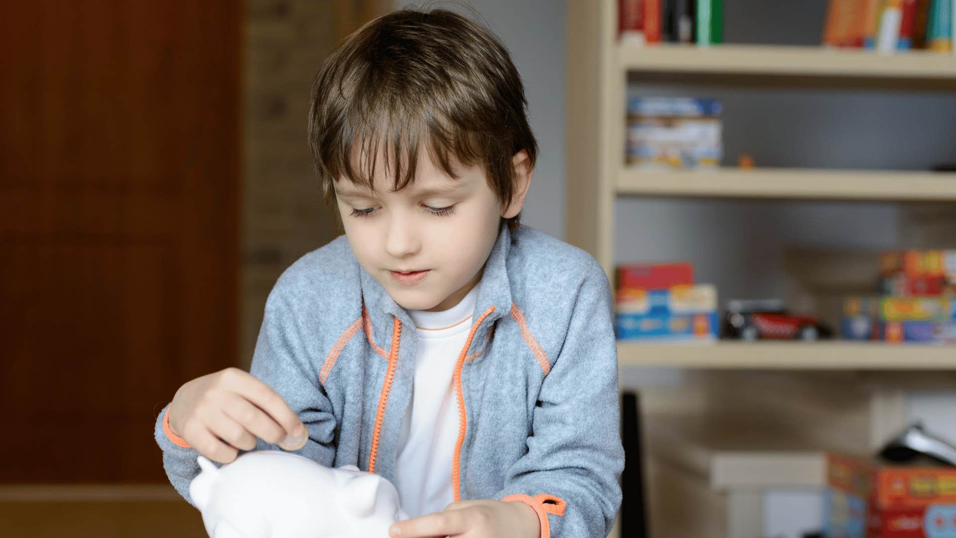 child counting his pennies