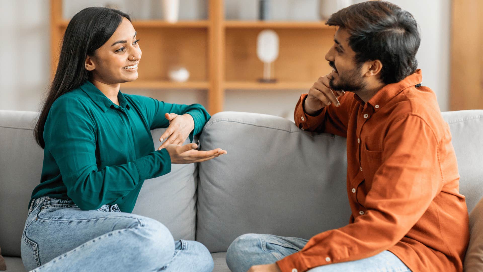 couple talking on couch