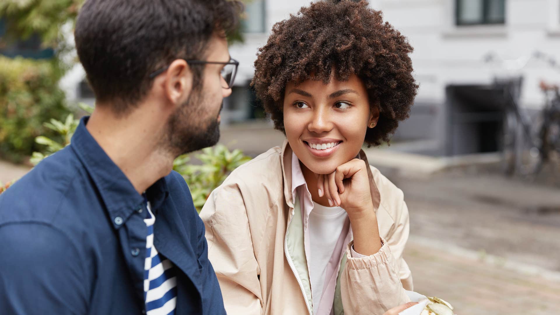 woman catching up with man in conversation