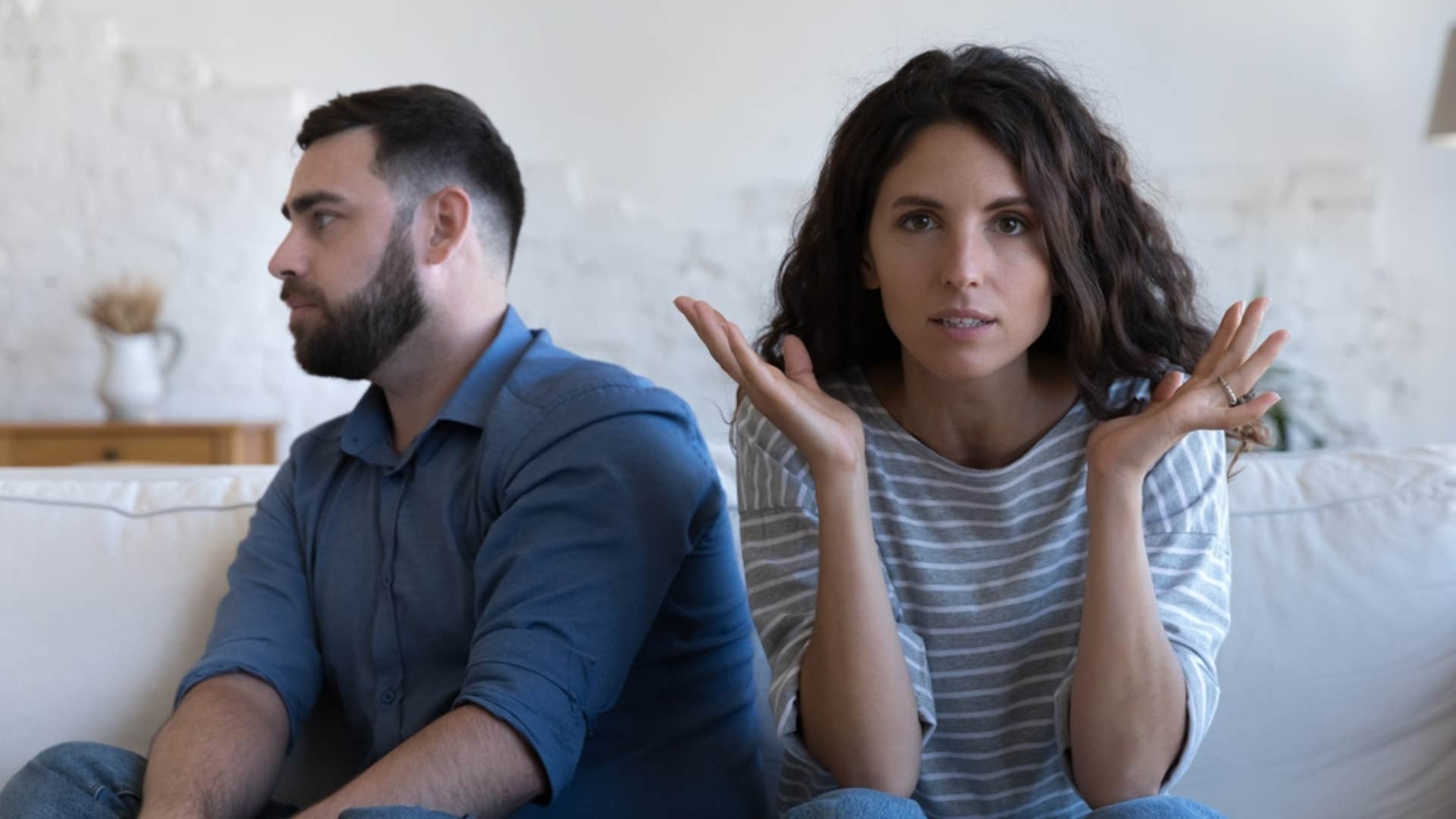 woman giving short and curt answers to husband