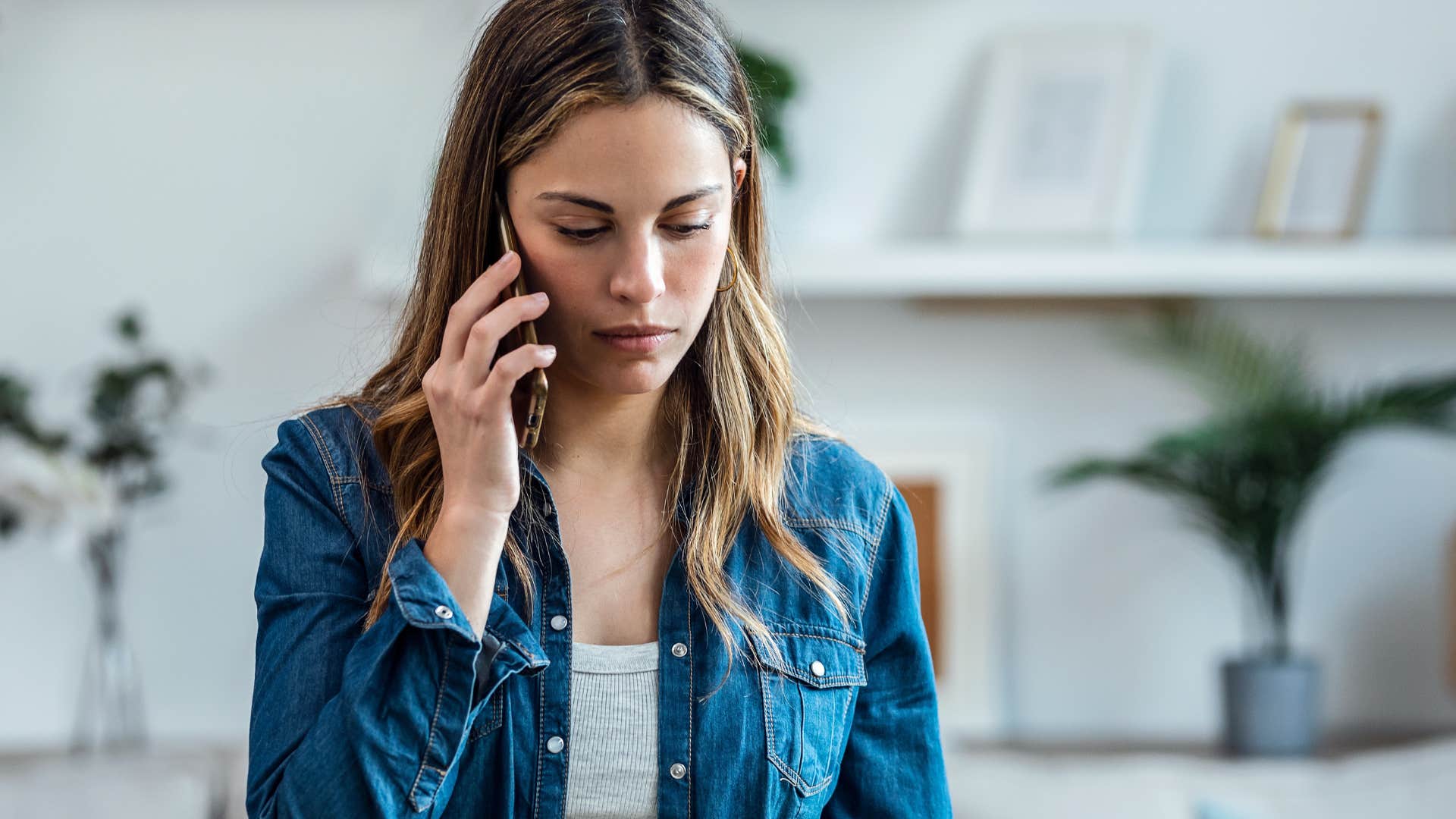 disappointed woman talking on the phone