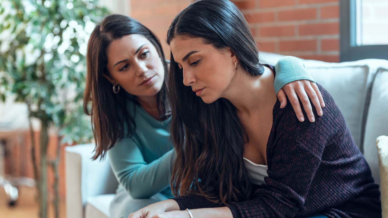 woman comforting friend in distress