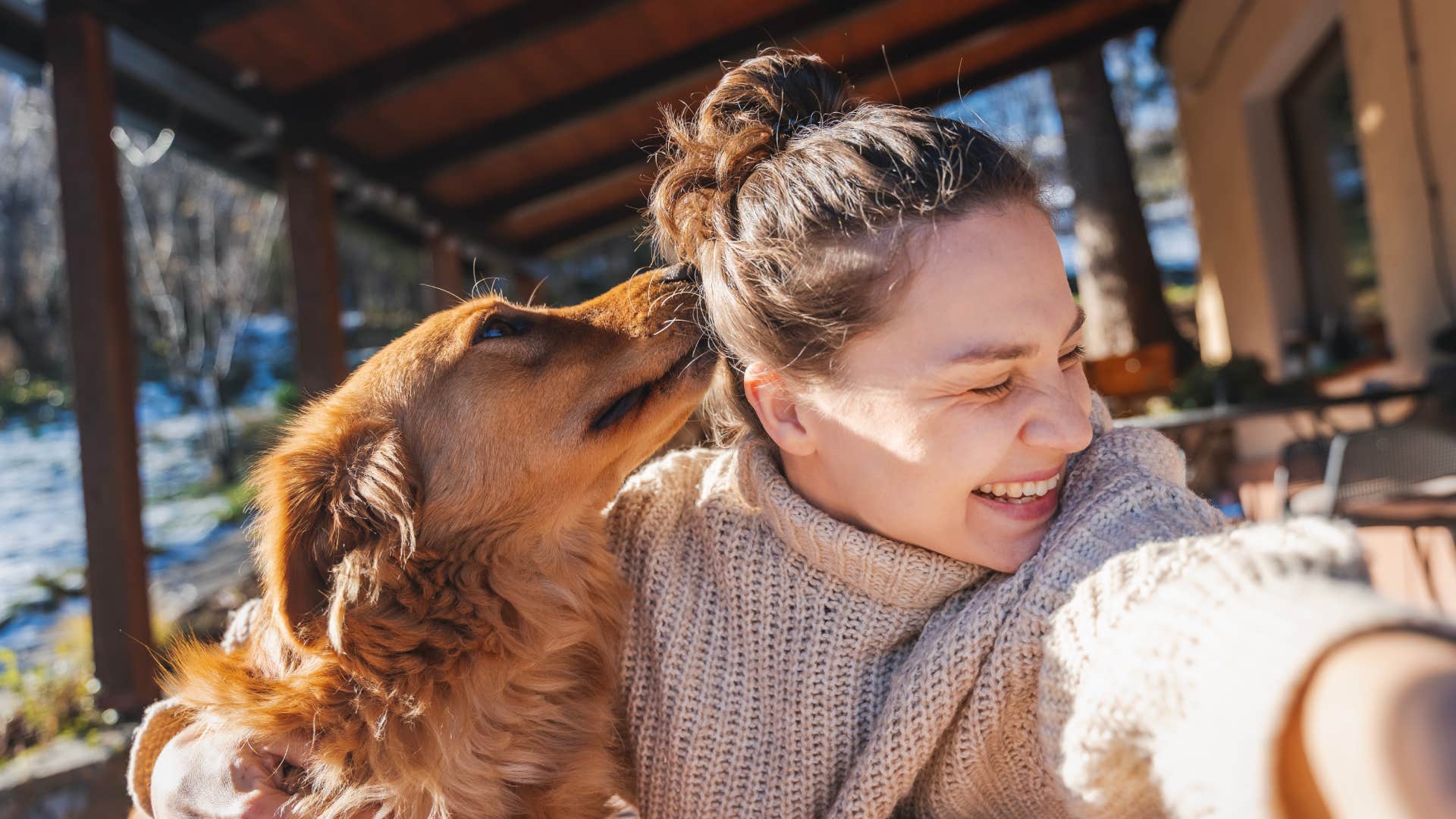 young woman with her labrador retriever