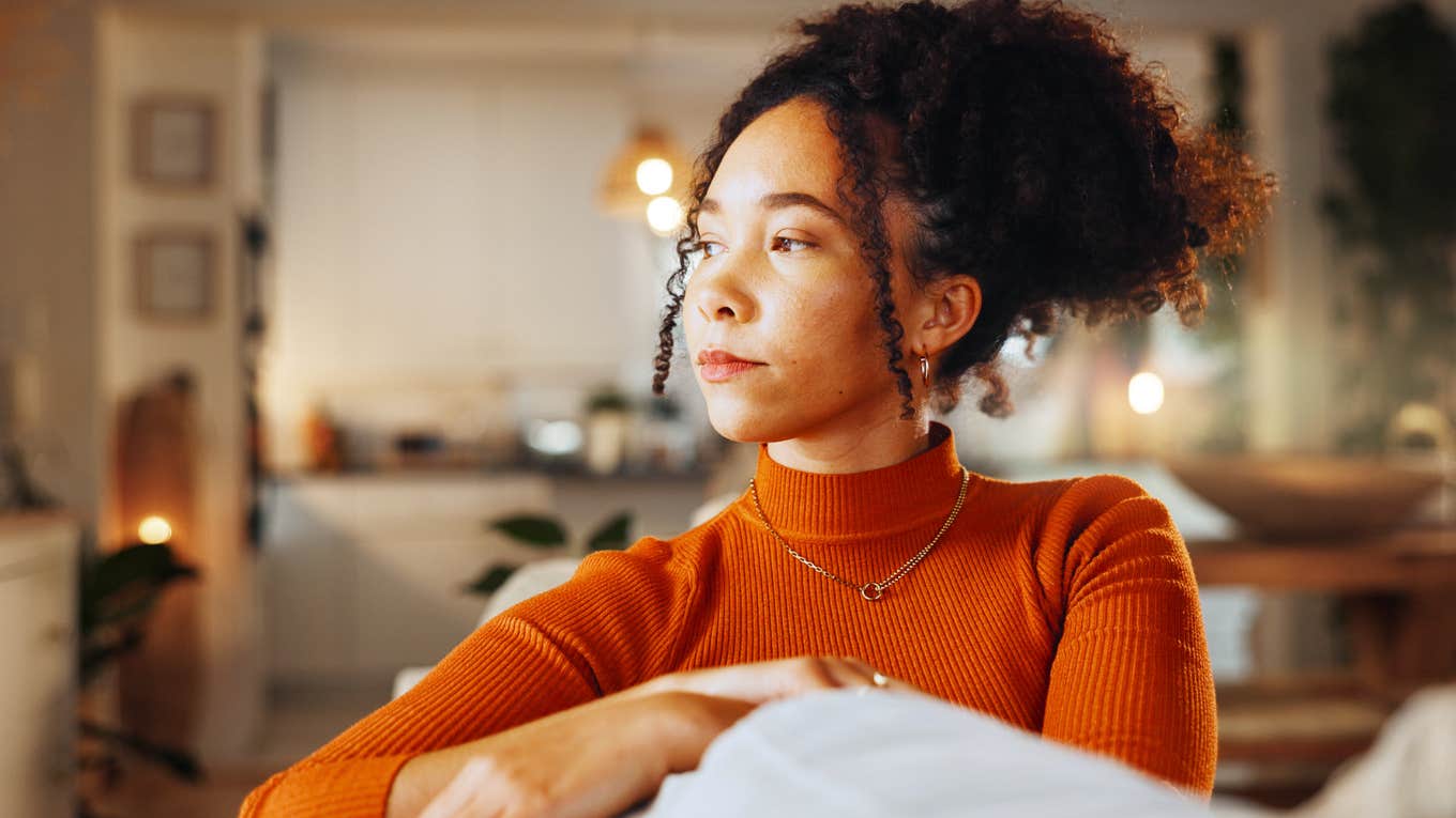 Woman only pretending to be happy in relationship.