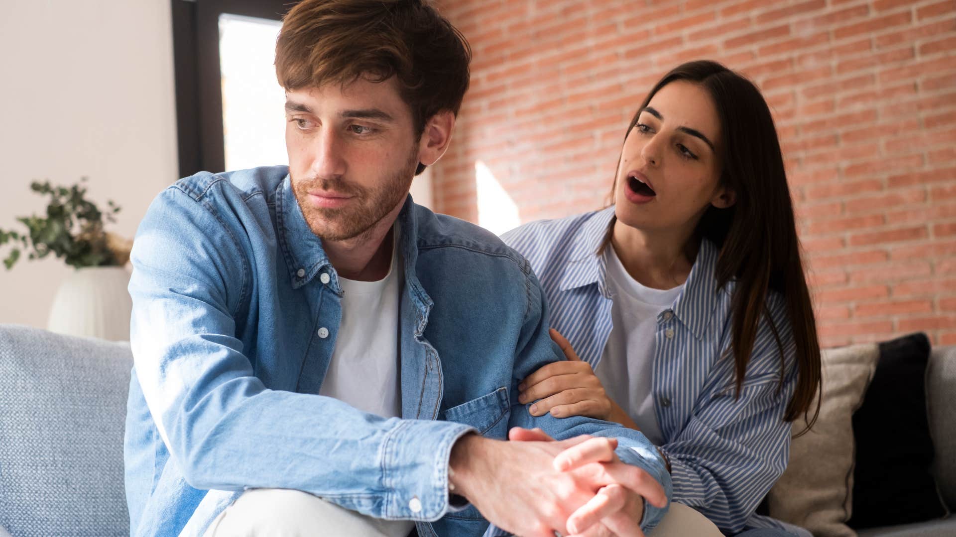 Woman arguing with her disengaged husband