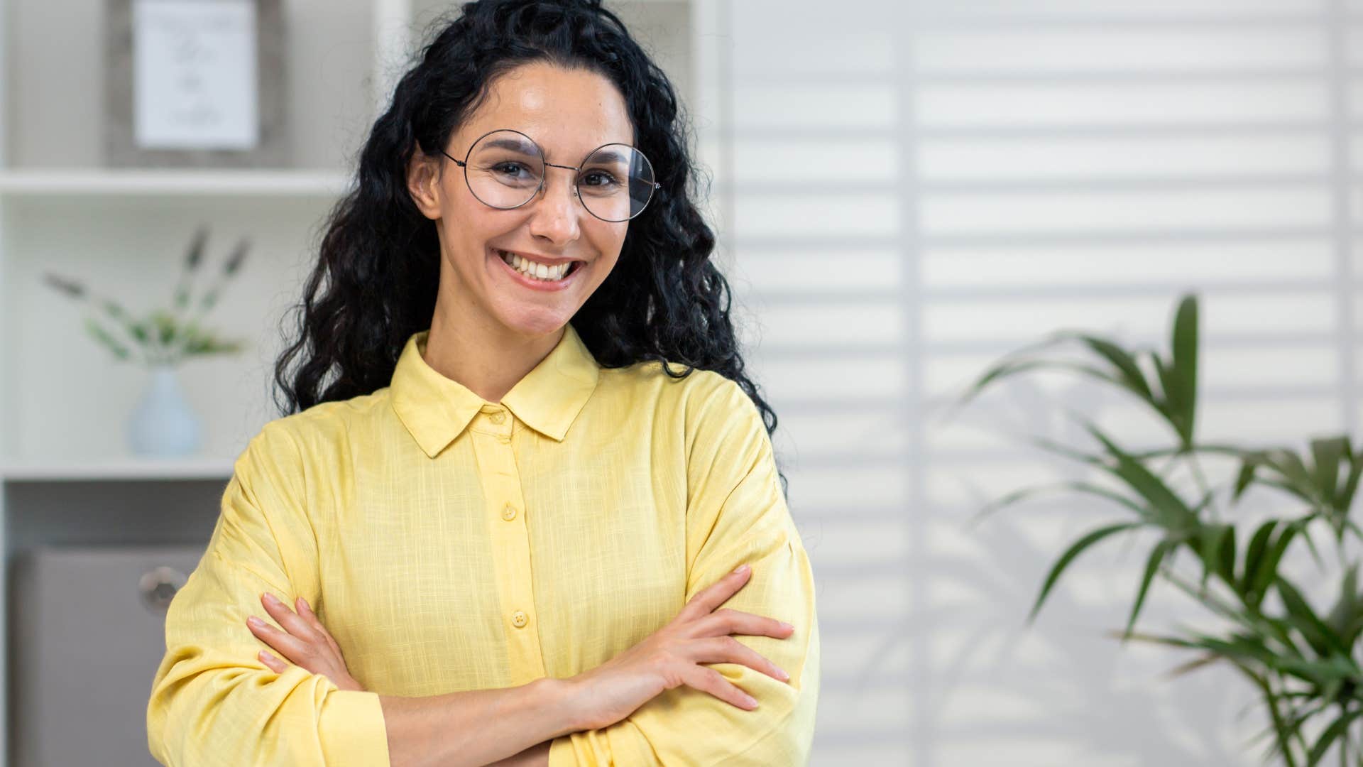 young woman wearing yellow shirt