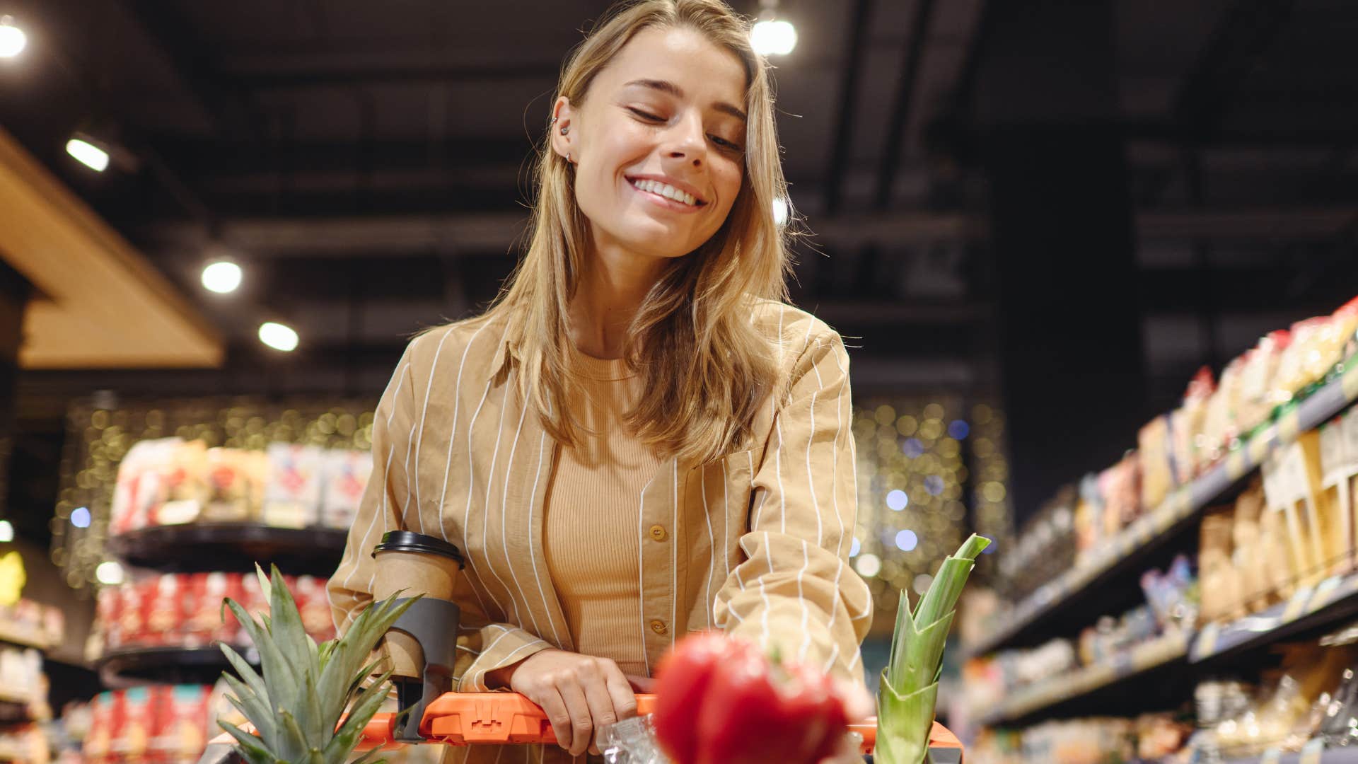 woman shopping organic food aisle