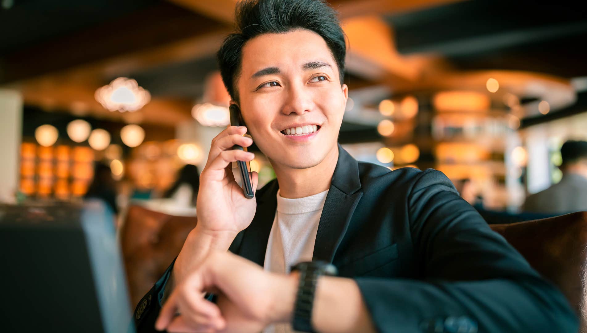 young professional man wearing a watch