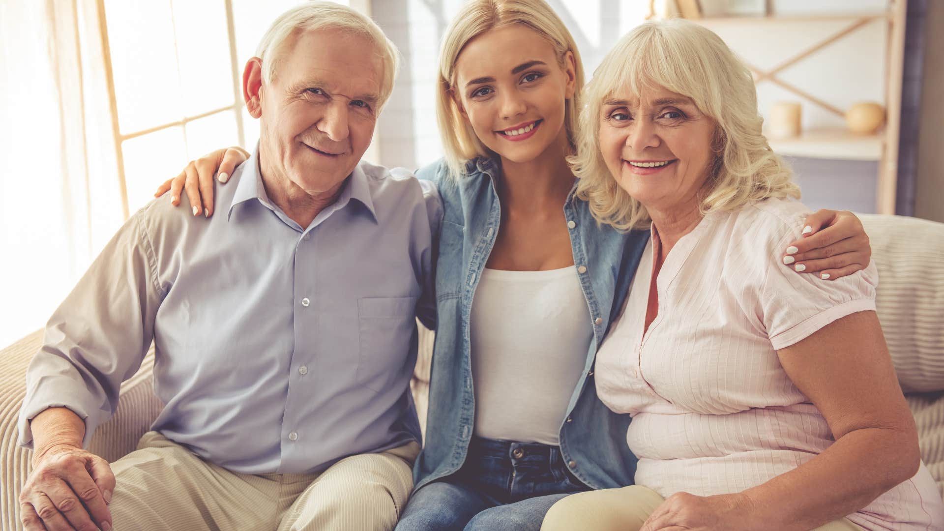 woman being supported by her parents