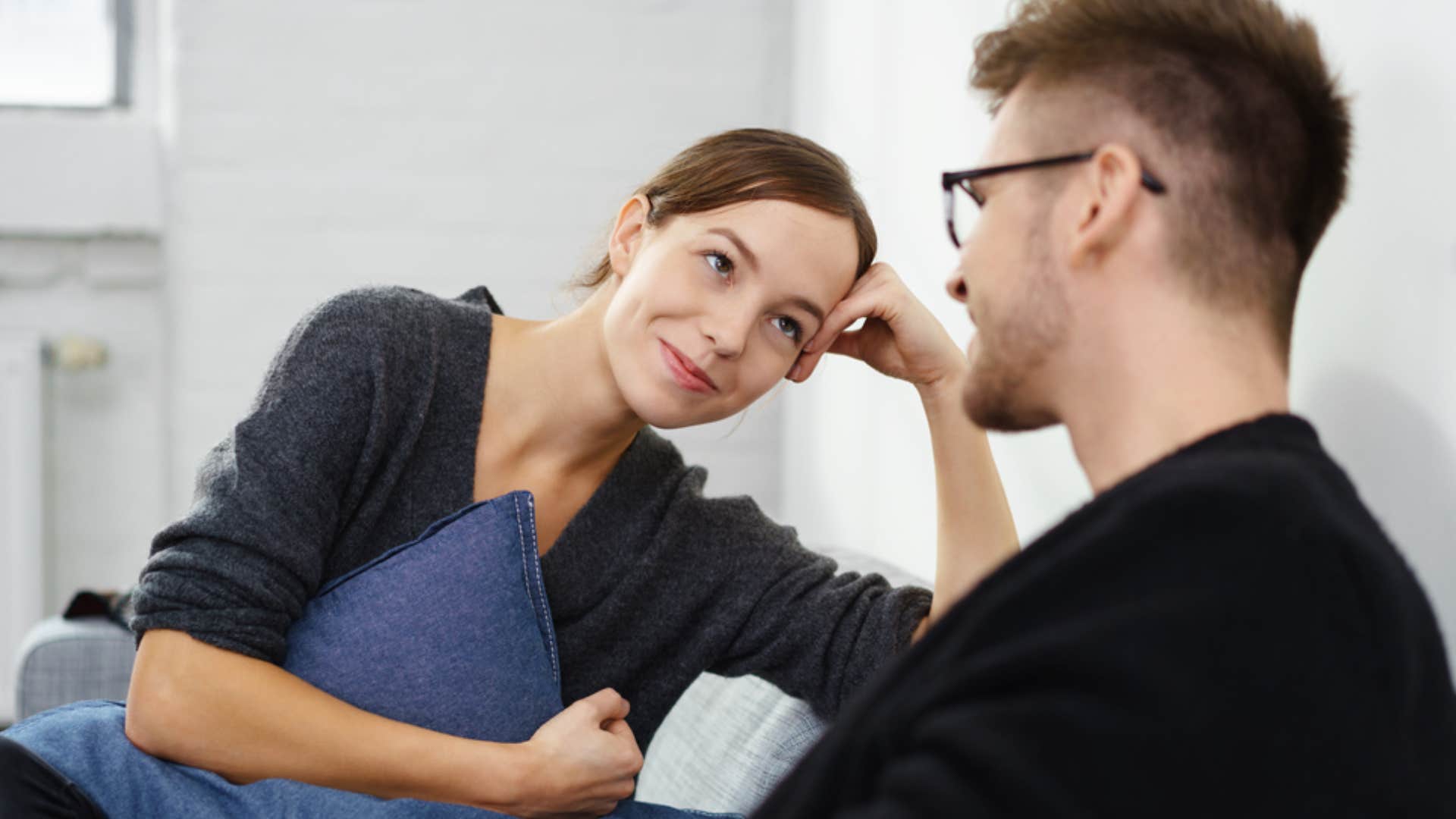 woman listening as man speaks his mind