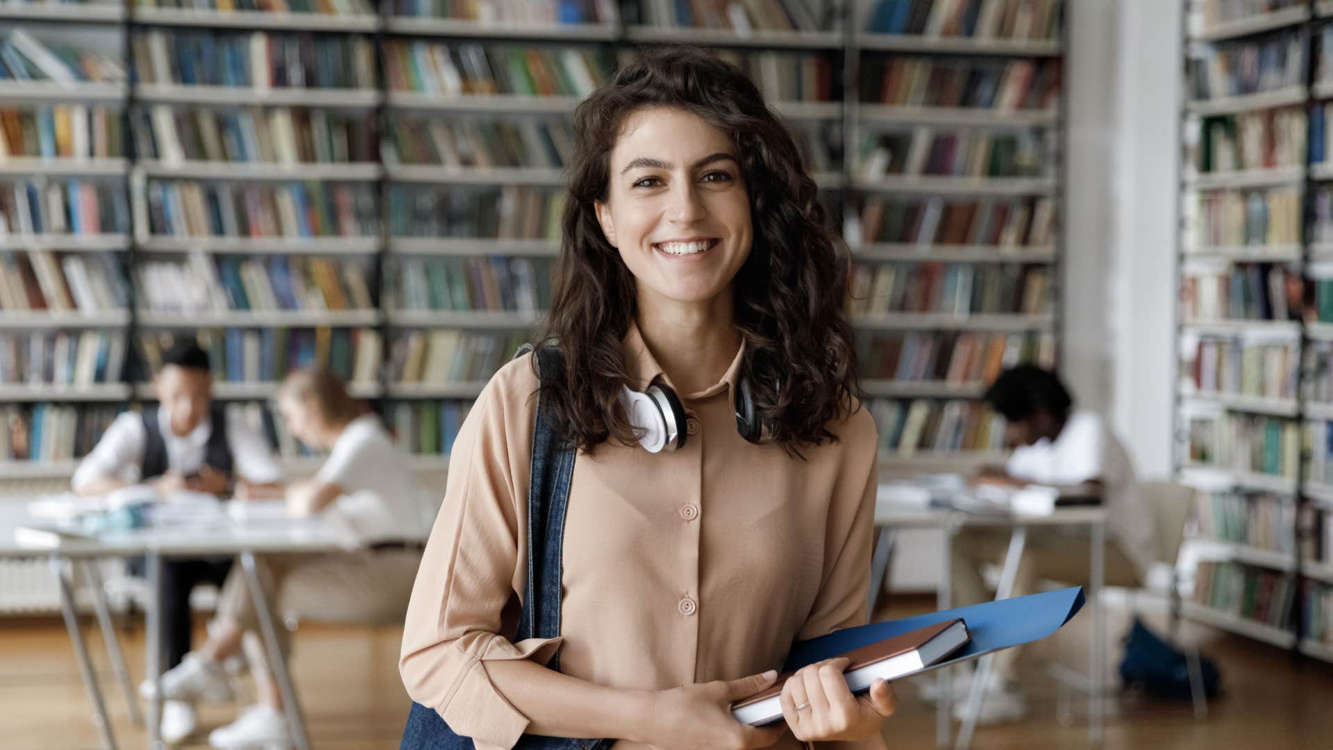 Gen Z woman standing in college library