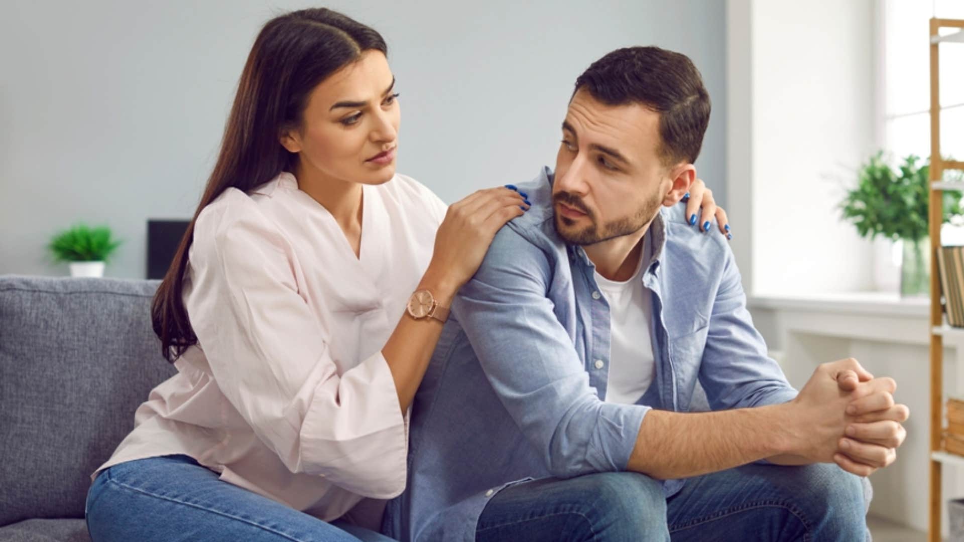 wife offering emotional support to husband