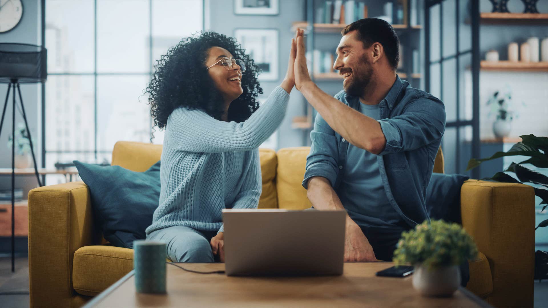 husband and wife compromising with high-five