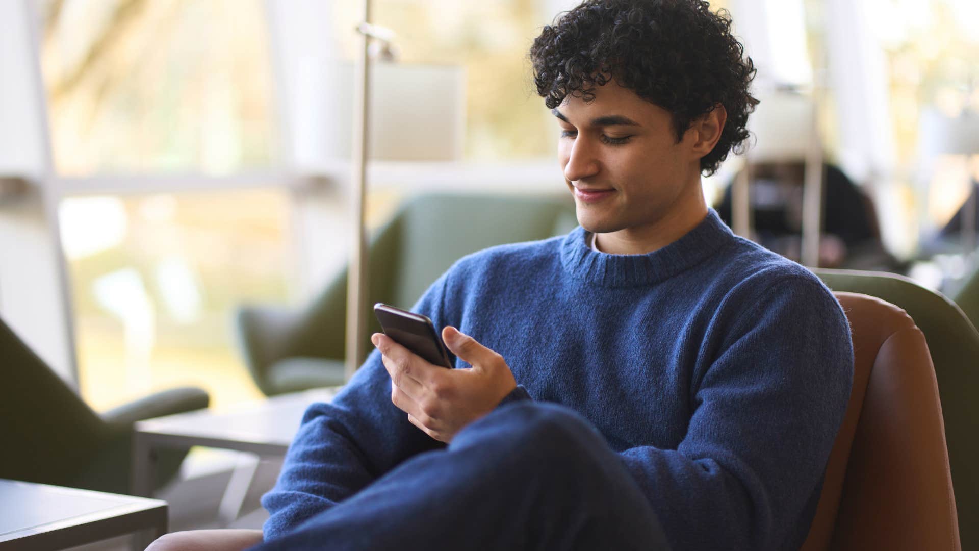 man online impulse buying shopping on his phone