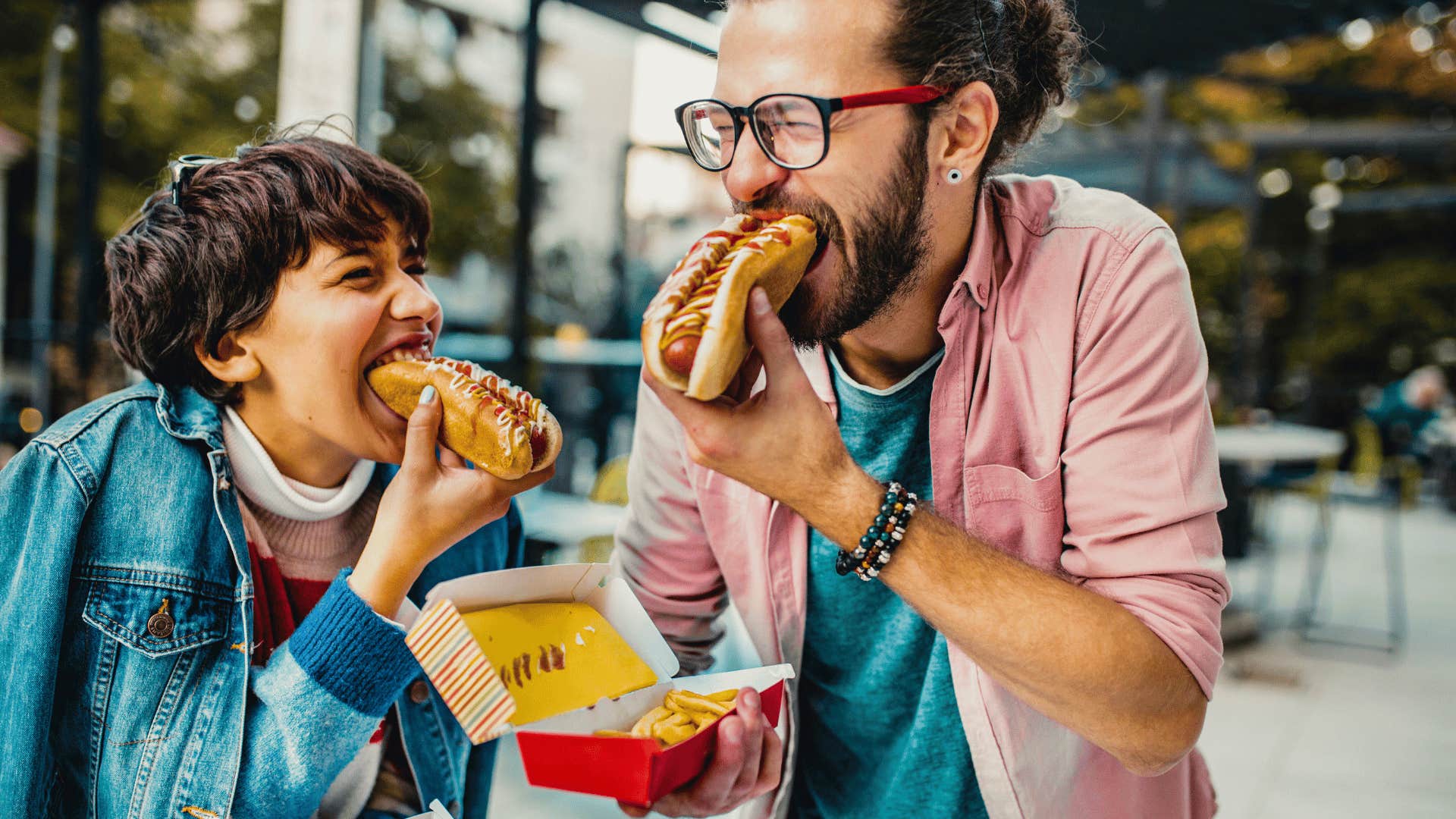 middle class couple eating fast food