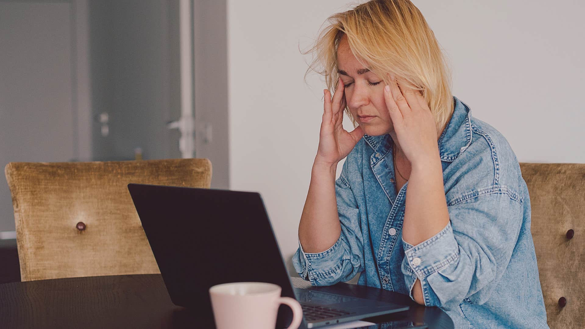 woman stressed from household responsibilities