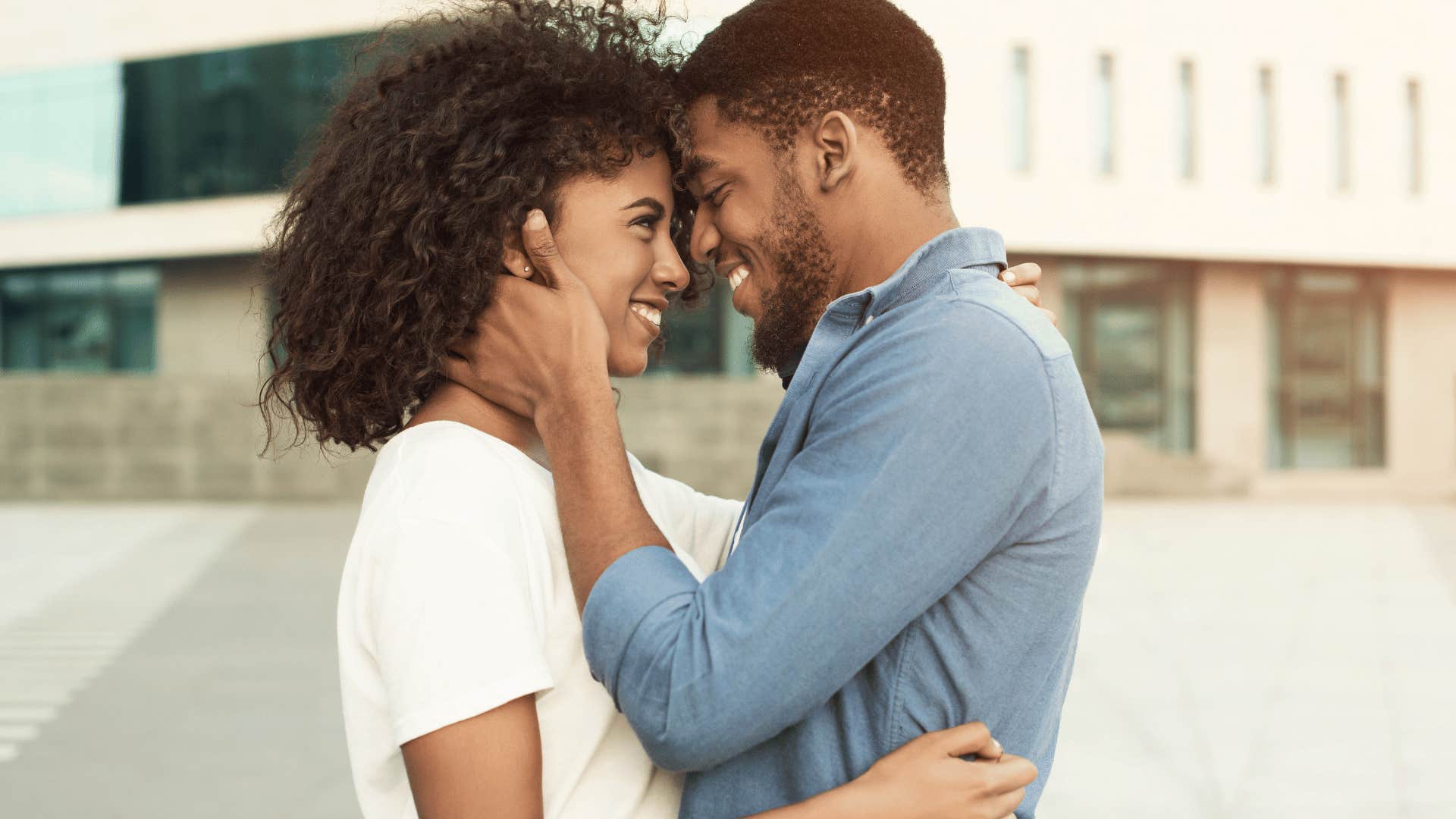 Couple in a happy marriage embracing affectionately in quiet gesture