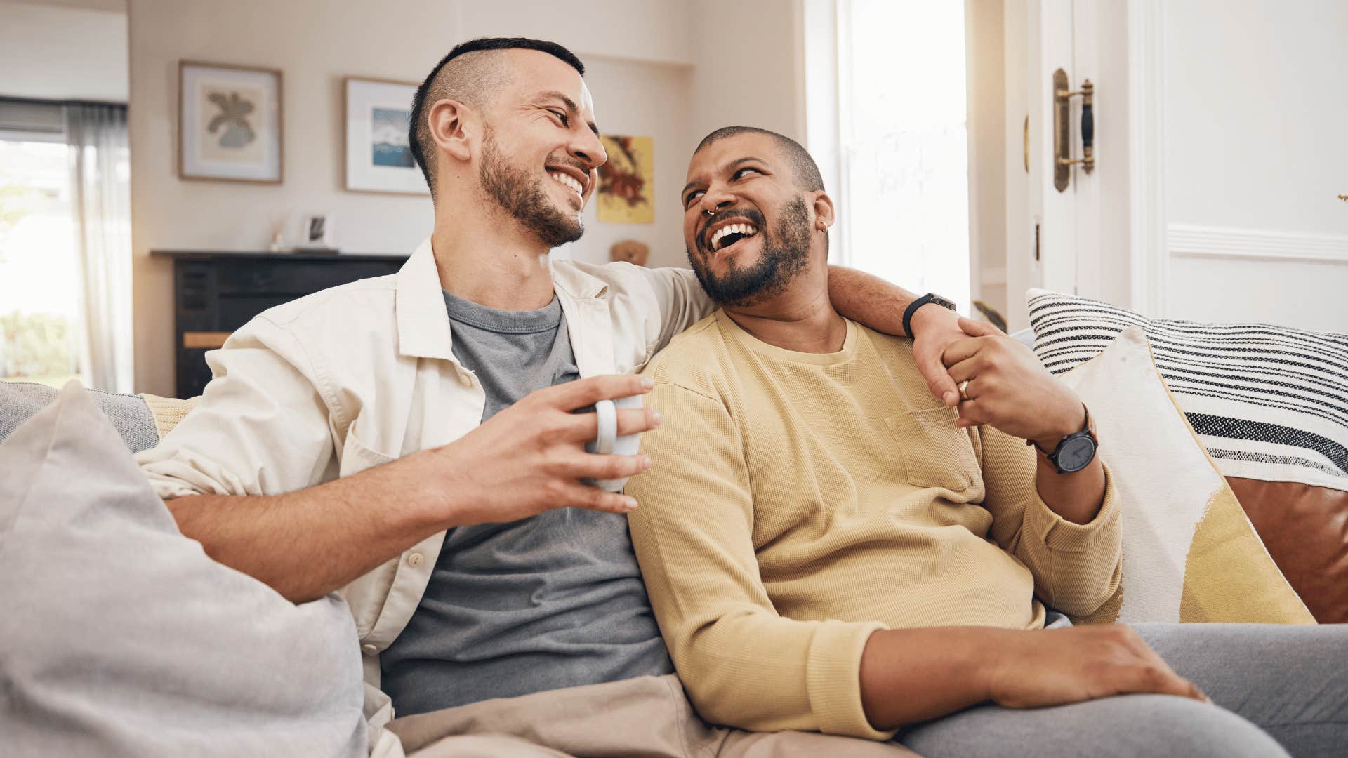 Couple laugh together in happy marriage with joy from within