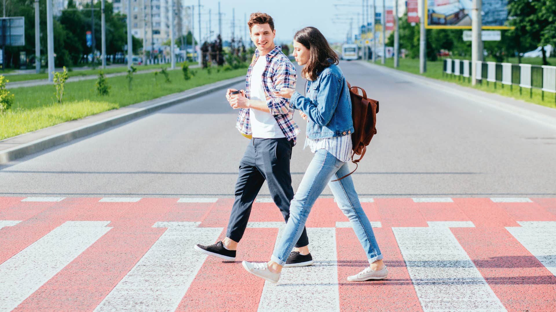 man and woman walking side by side