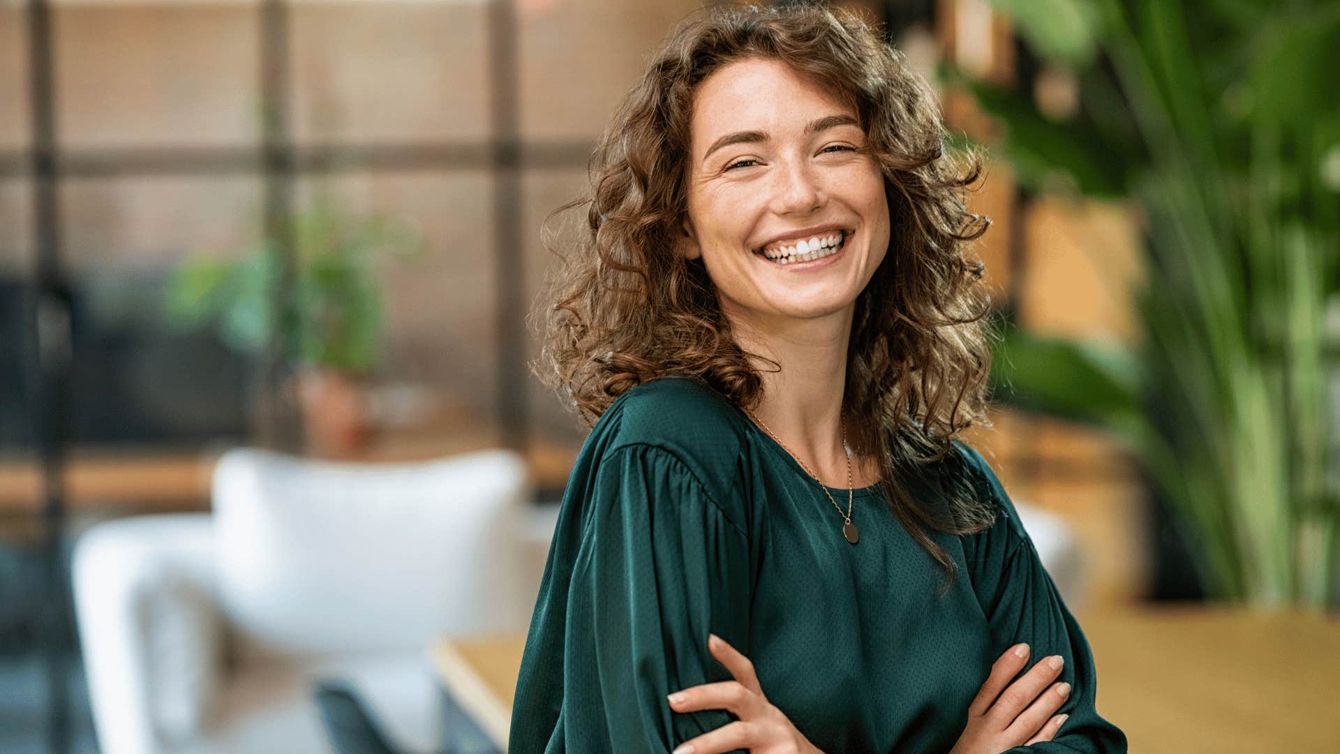 woman smiling and tilting head