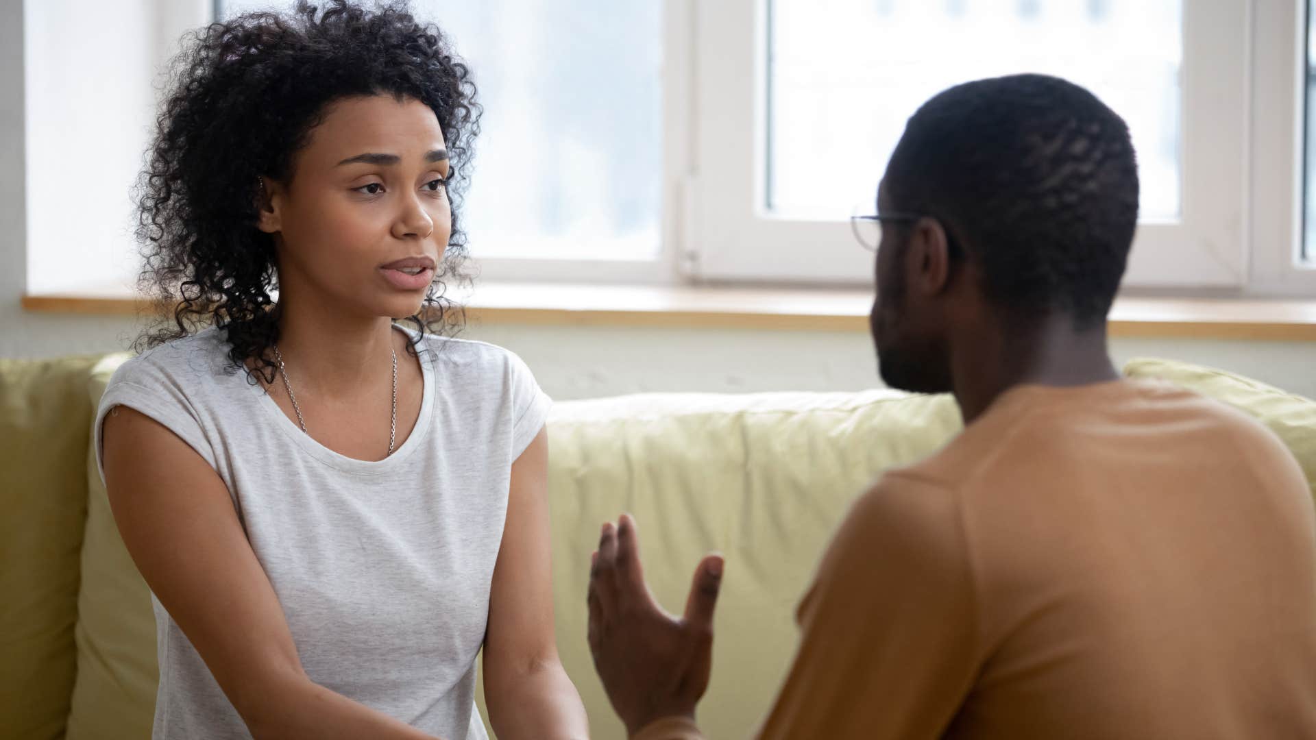 woman and man having emotional conversation