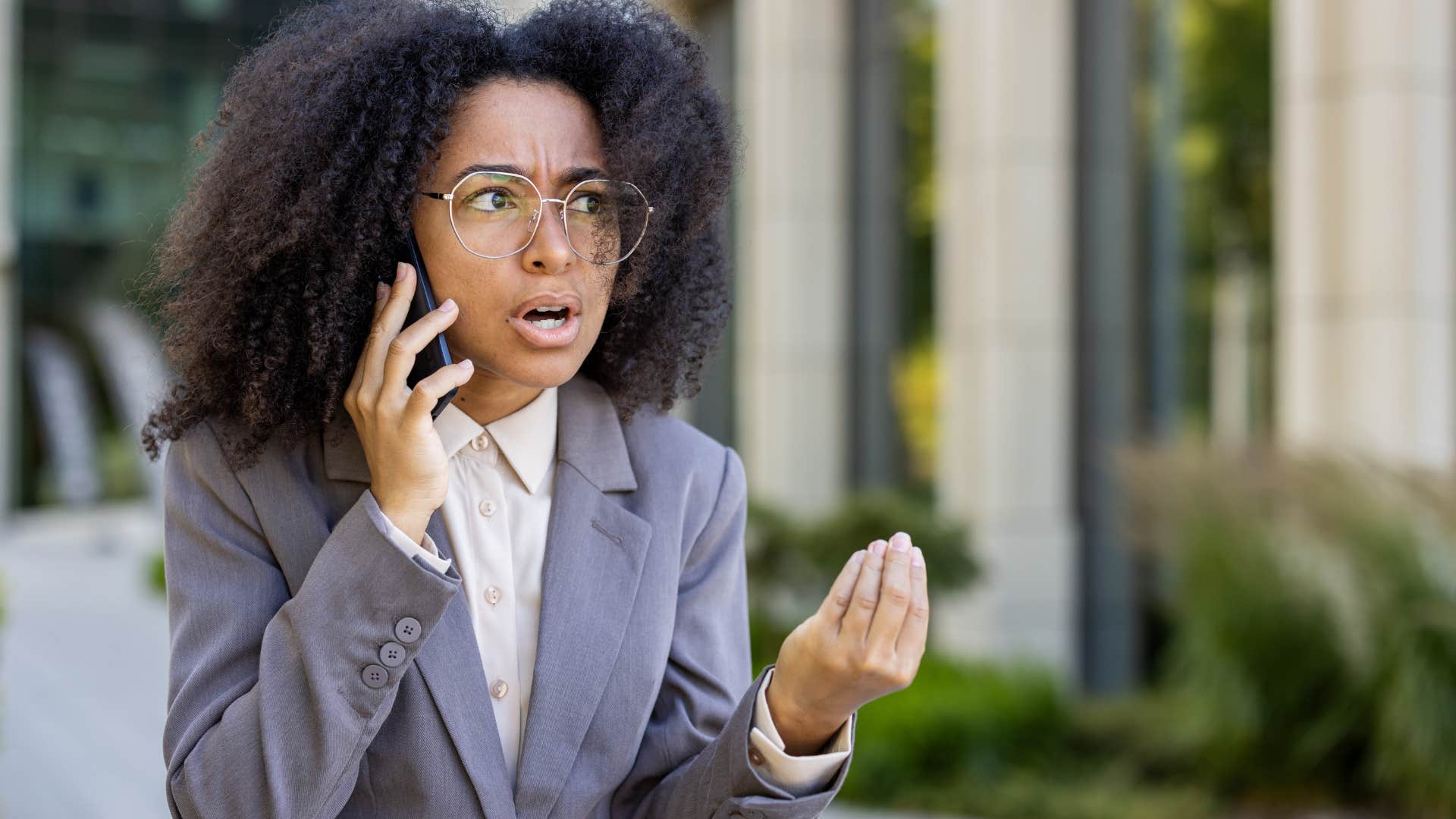 upset woman talking on the phone