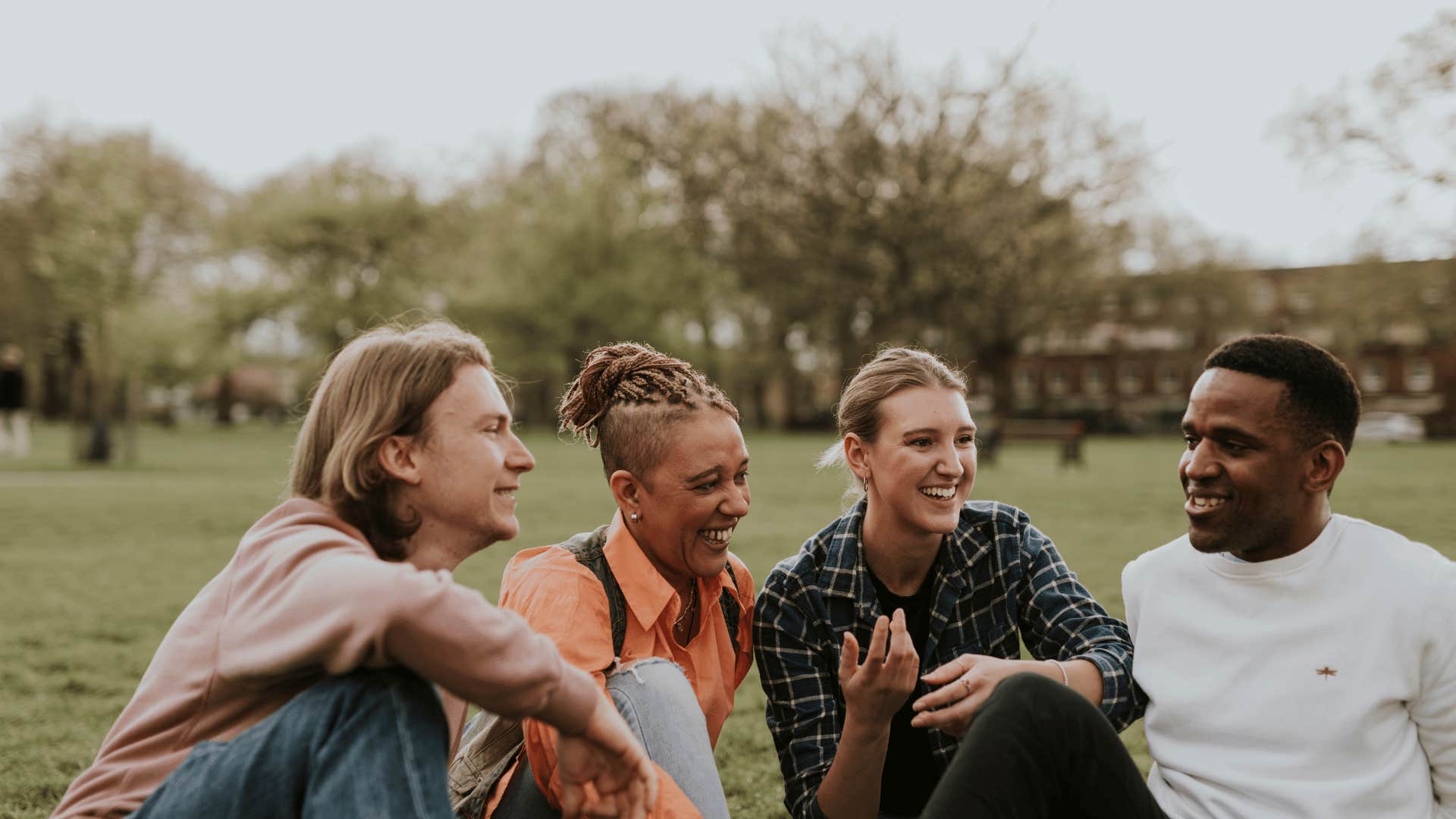 friends hanging out in park