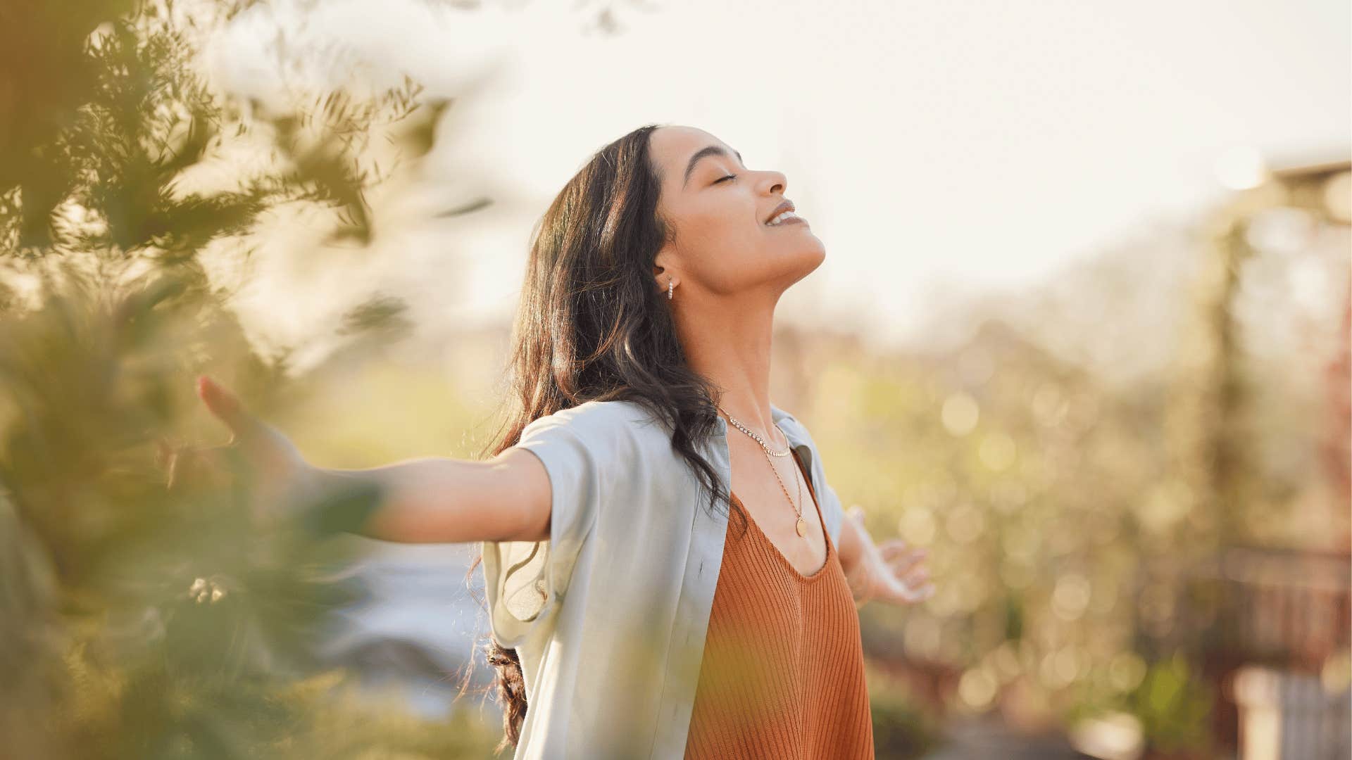 woman outside breathing in the air