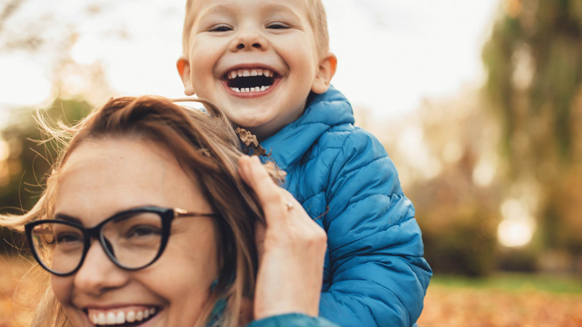 kid laughing while mom talks about The tooth fairy