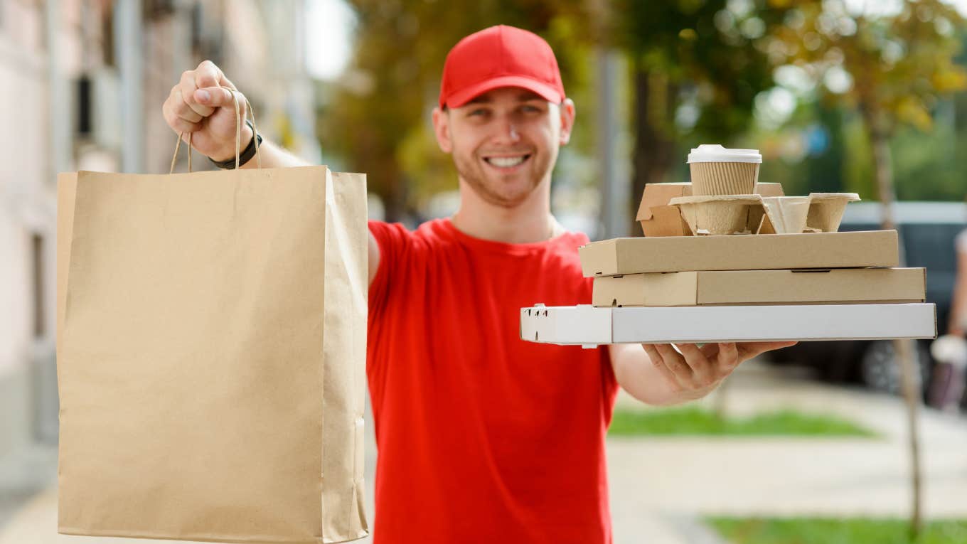 Uber Eats driver delivering food