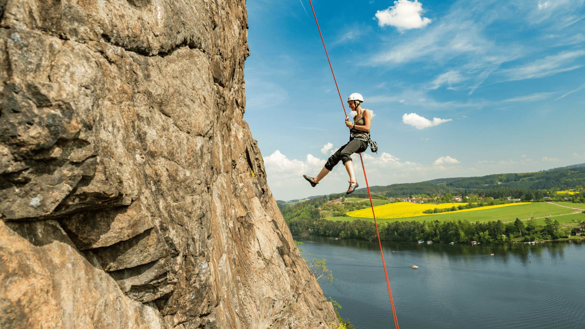 woman rockclimbing