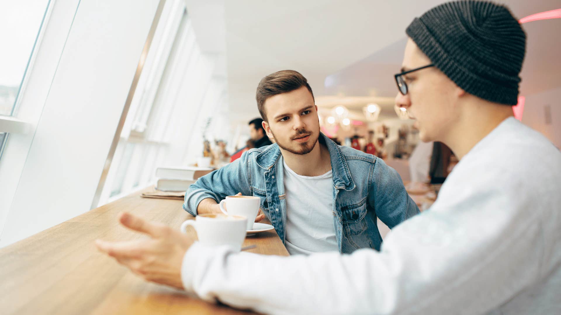 men having a stern conversation