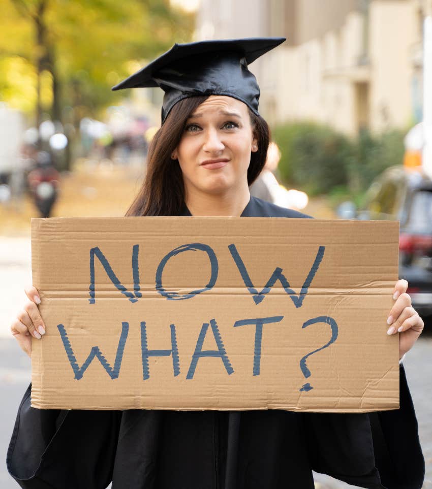 Unhappy graduate whose accomplishment doesn't feel like an accomplishment